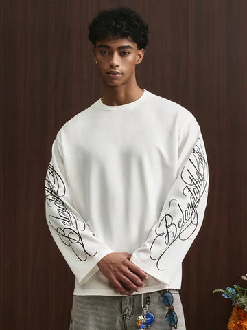 Oversized longsleeve met alfabetische print