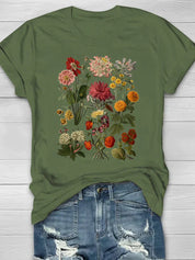 Vintage T-shirt met bloemenprint, perfecte combinatie van comfort en trendy stijl. Ideaal voor diverse gelegenheden en ontworpen voor bewegingsvrijheid.