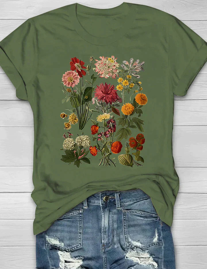 Vintage T-shirt met bloemenprint, perfecte combinatie van comfort en trendy stijl. Ideaal voor diverse gelegenheden en ontworpen voor bewegingsvrijheid.