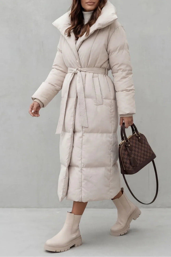 Lange puffer jas met ceintuur