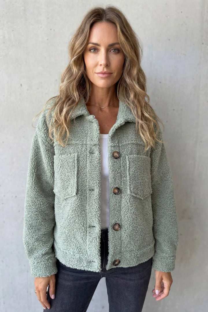 Fleece jas met knopen en zakken