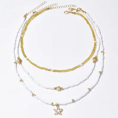 Ketting met schelp en ster