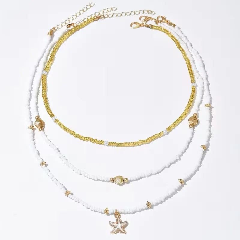 Ketting met schelp en ster