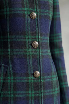 Lange jas met Highland check