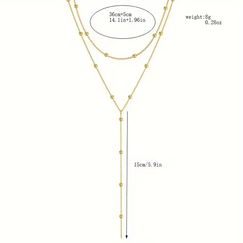 Ketting met rijstparels en franjes