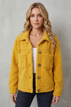 Fleece jas met knopen en zakken