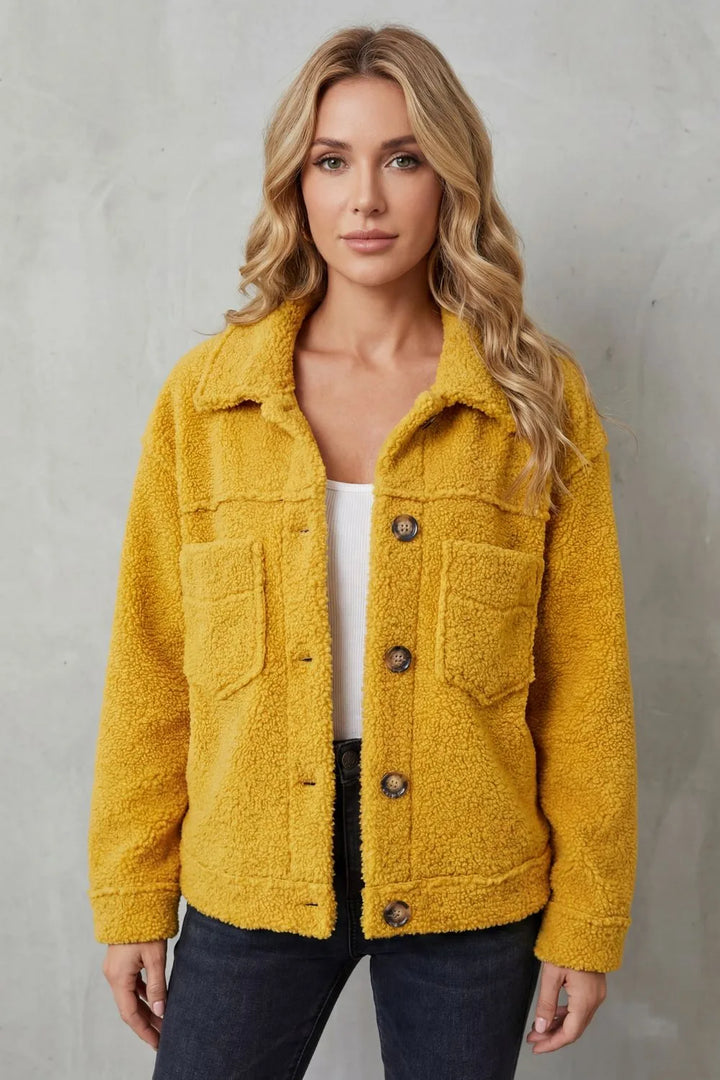 Fleece jas met knopen en zakken