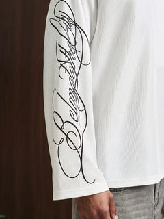 Oversized longsleeve met alfabetische print