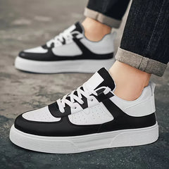 Lage sneakers met perforaties