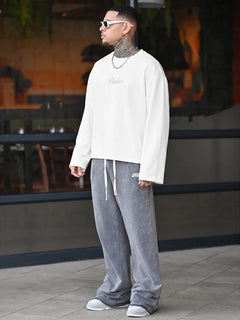 Oversized longsleeve met graphic slogan