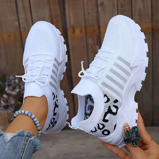 Lage sneaker met leopard print