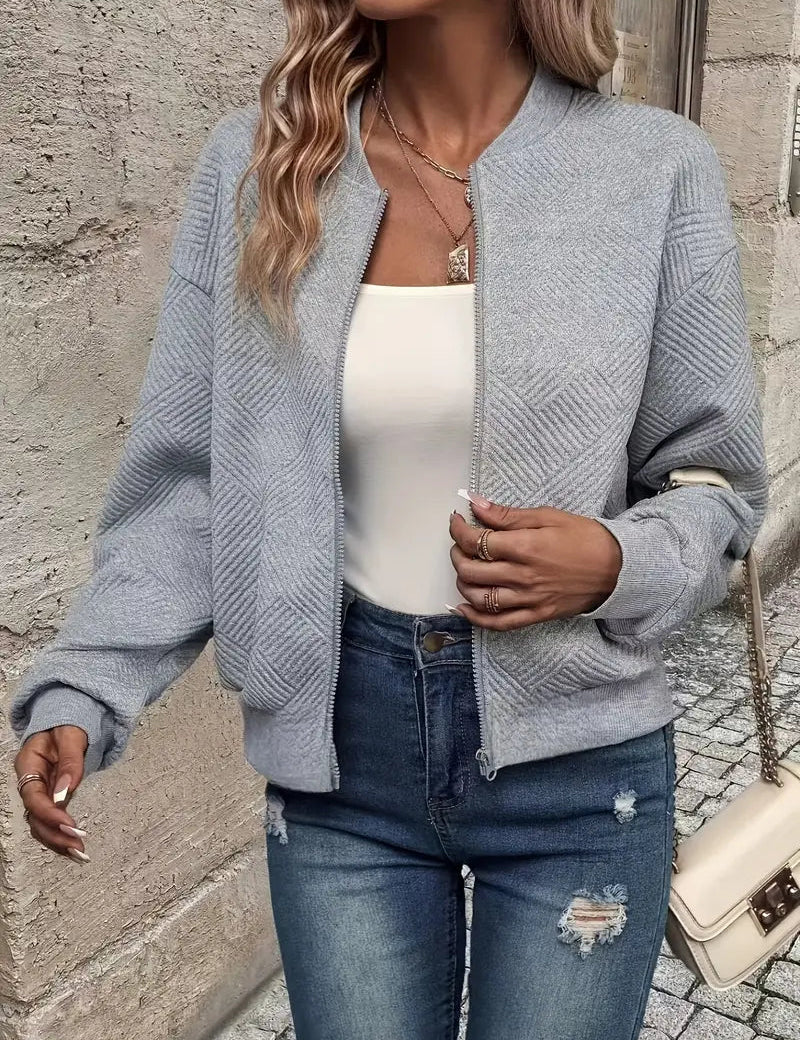 Bomberjack met geometrisch patroon en ronde hals