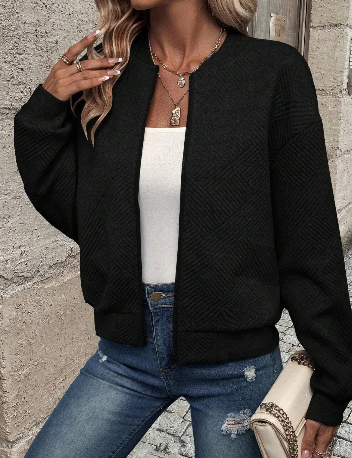 Bomberjack met geometrisch patroon en ronde hals