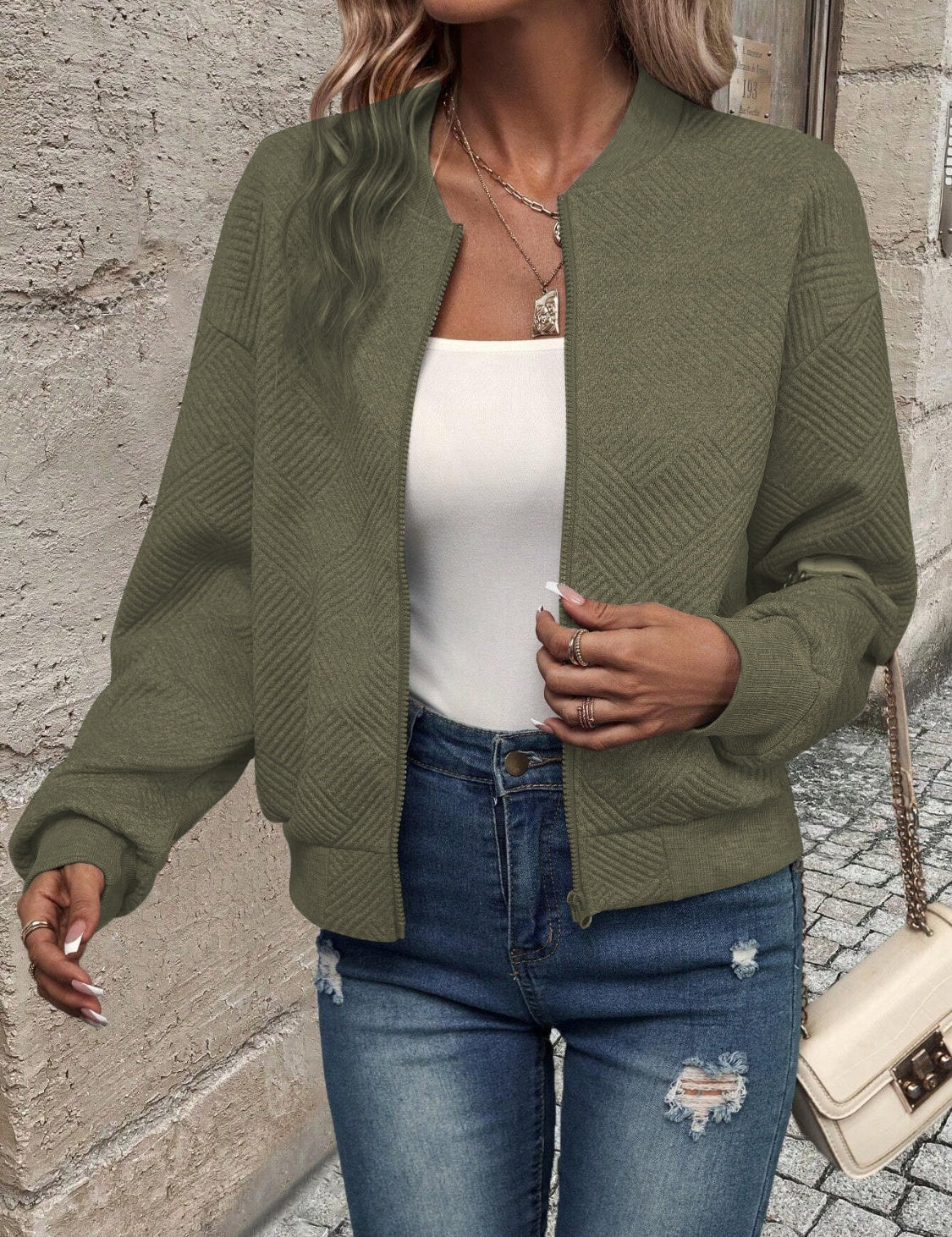 Bomberjack met geometrisch patroon en ronde hals