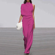 Elegante en tijdloze jumpsuit - de ultieme combinatie van stijl en comfort. Mouwloos met een losse pasvorm voor ultiem gemak en veelzijdigheid.