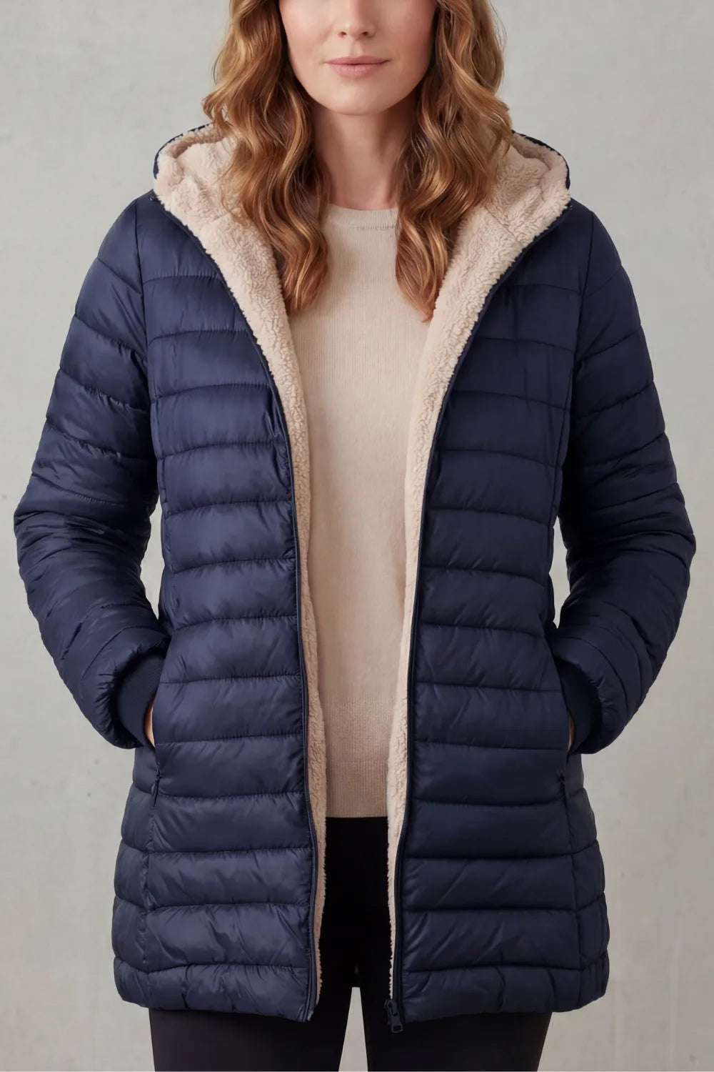 Zwarte puffer jas met capuchon