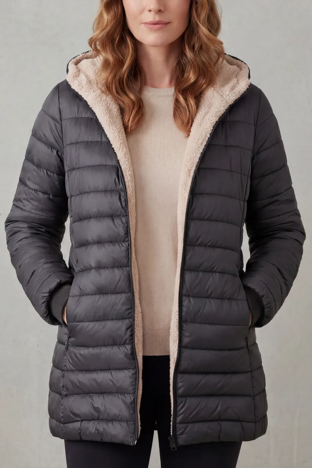 Zwarte puffer jas met capuchon