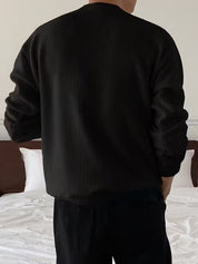 Gebreide trui met ronde hals en lange mouwen