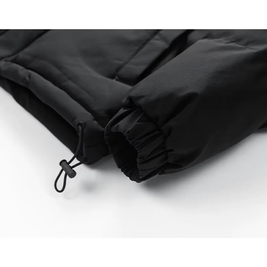 Gewatteerde jas met capuchon en elastische boorden