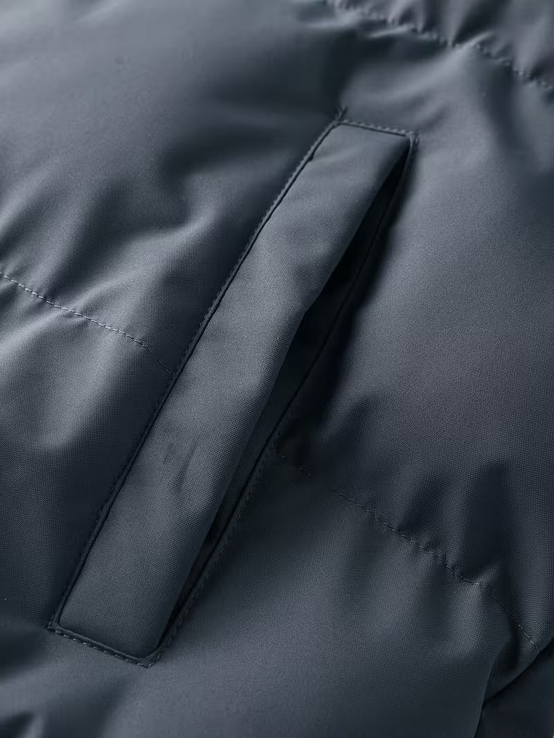 Gewatteerde jas met capuchon en fleece voering