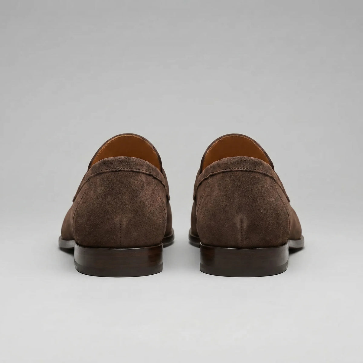 Bruine penny loafers met suède look
