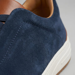 Slip-on sneakers met suède