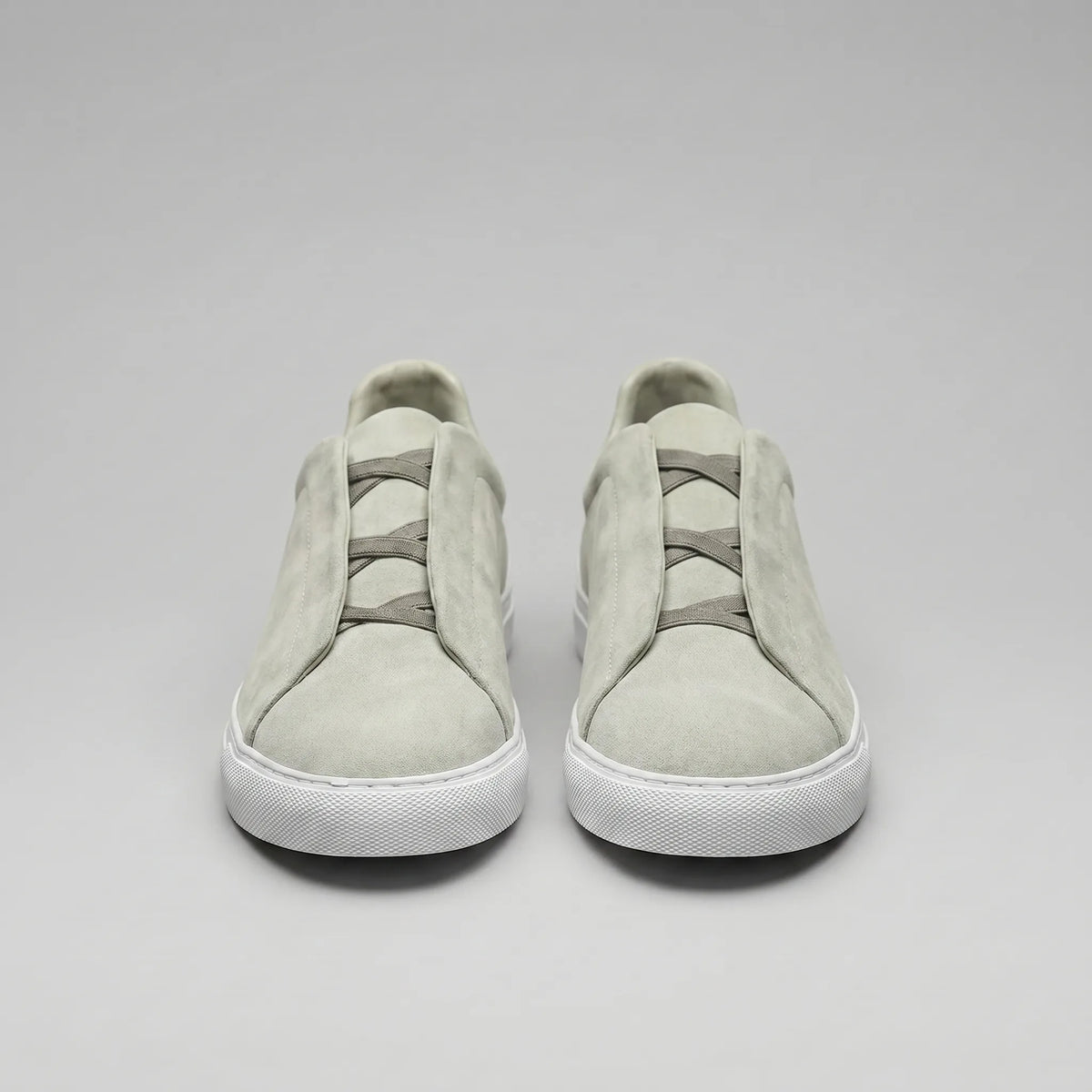 Slip-on sneakers met suède