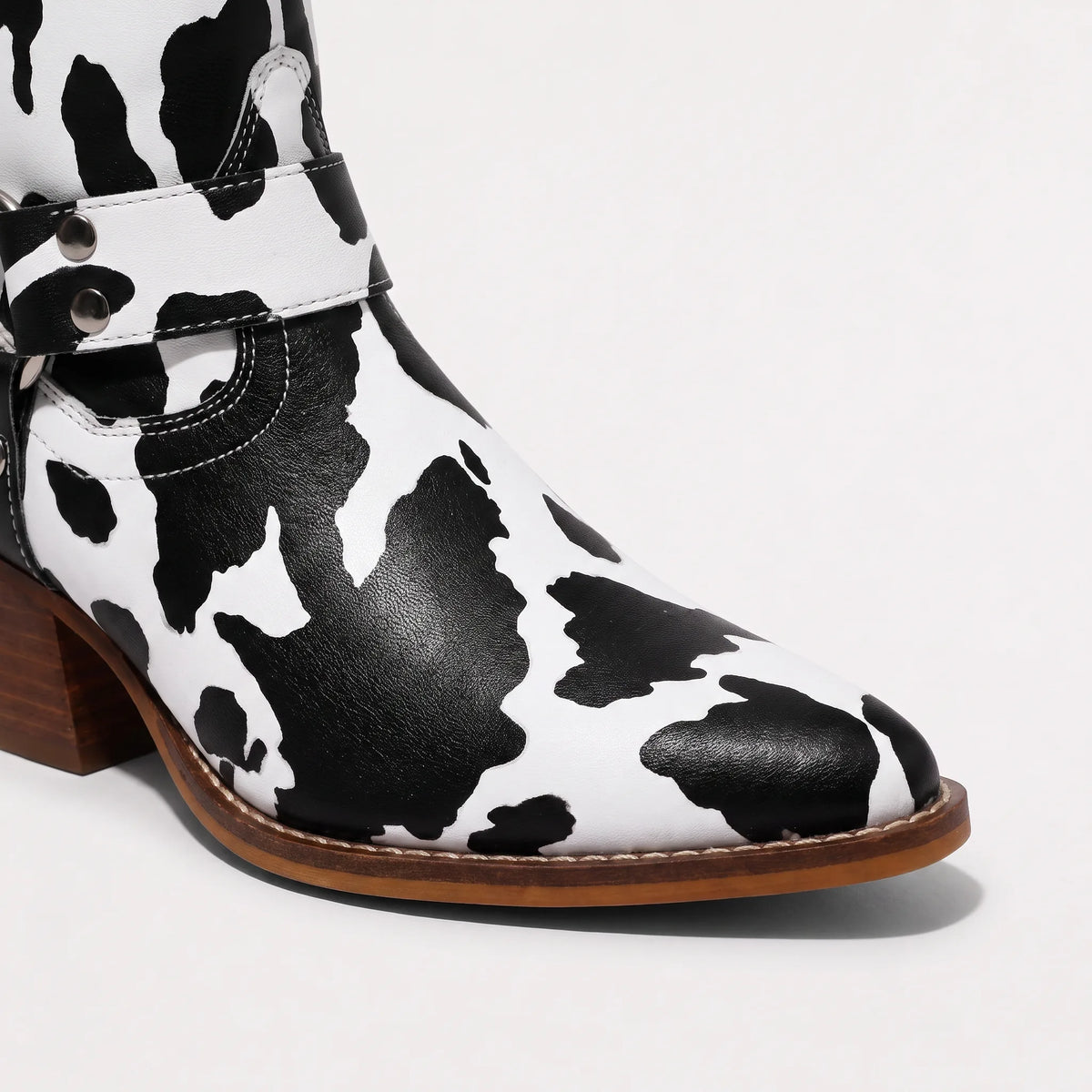 Cowboy boots met cow-print