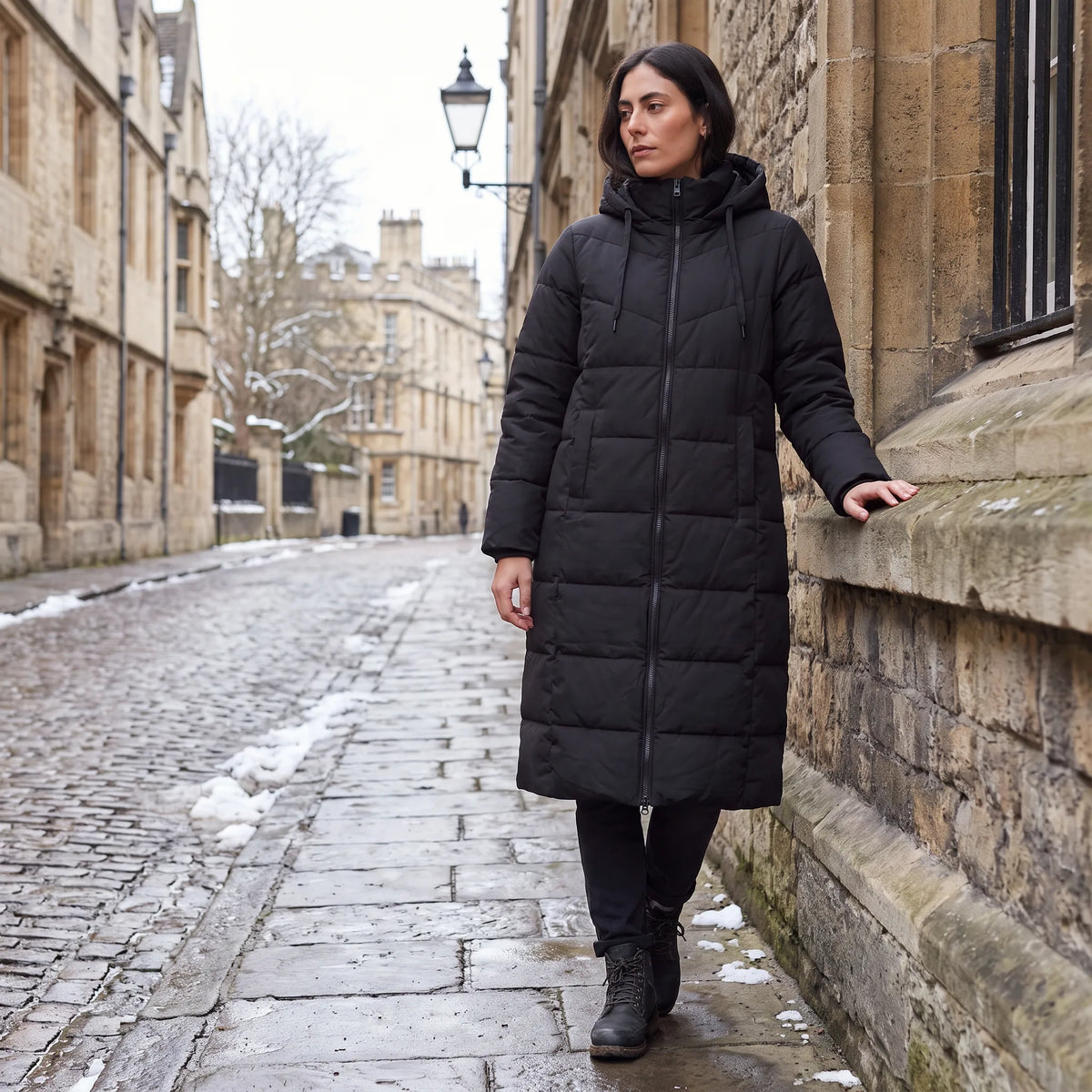 Lange puffer coat met capuchon
