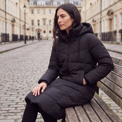 Lange puffer coat met capuchon