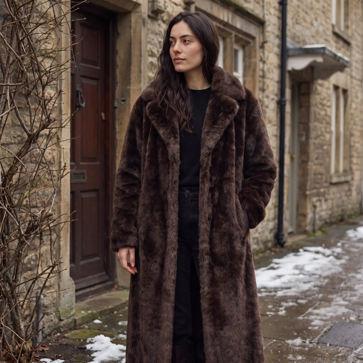 Lange faux fur jas met zakken