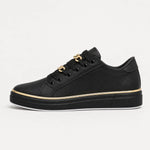 Zwarte trainers met gouden details