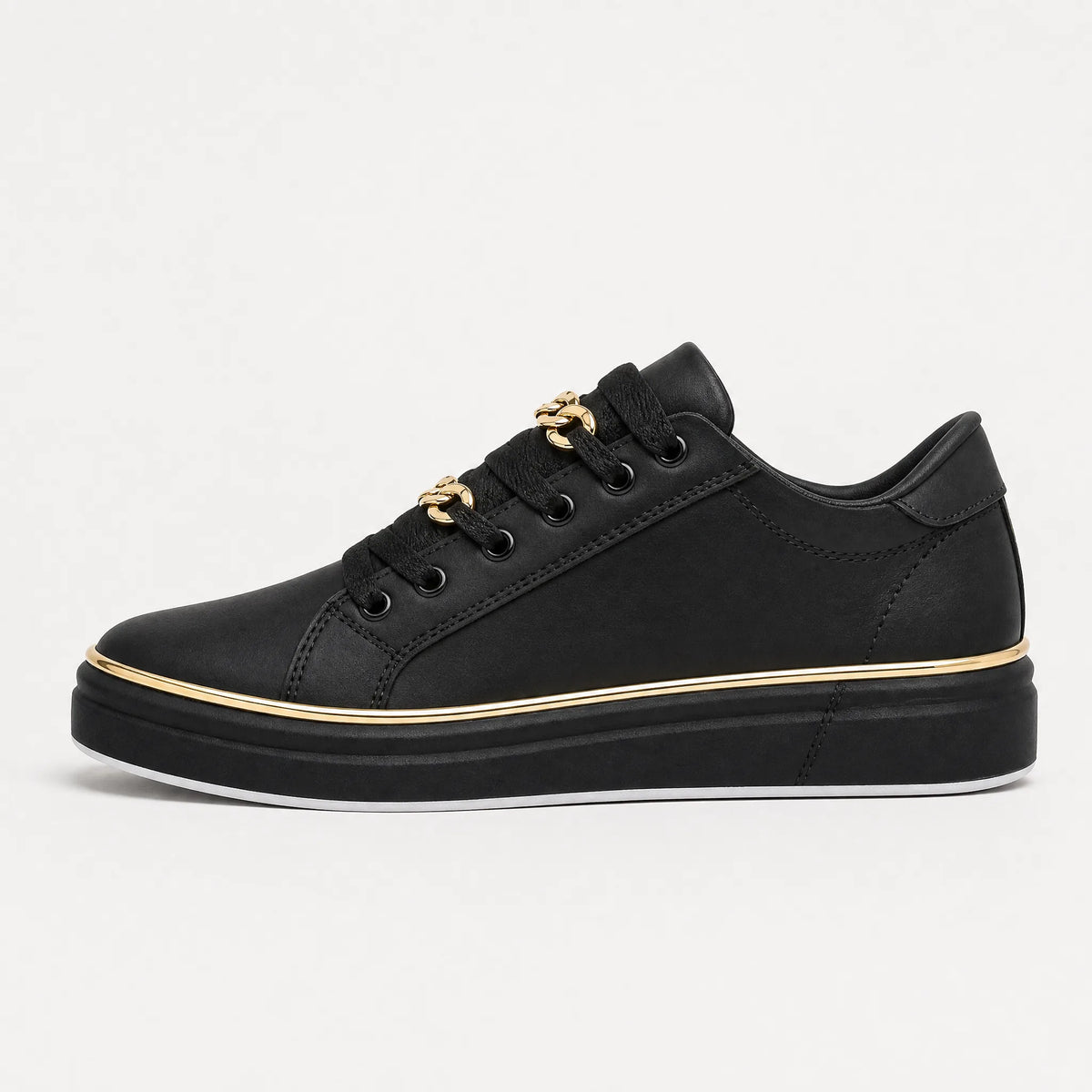 Zwarte trainers met gouden details