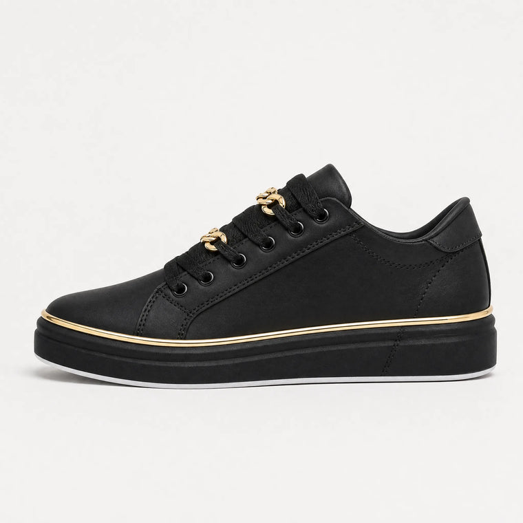 Zwarte trainers met gouden details