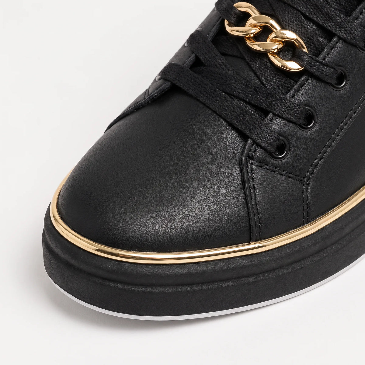Zwarte trainers met gouden details