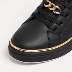 Zwarte trainers met gouden details