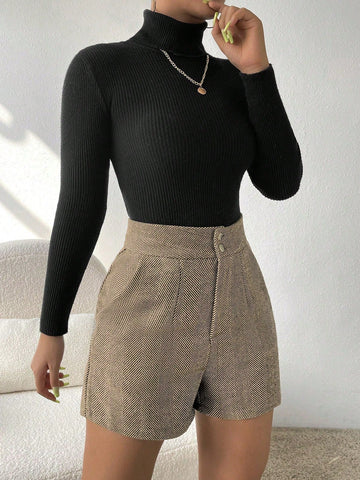 Korte broek met visgraatmotief en hoge taille