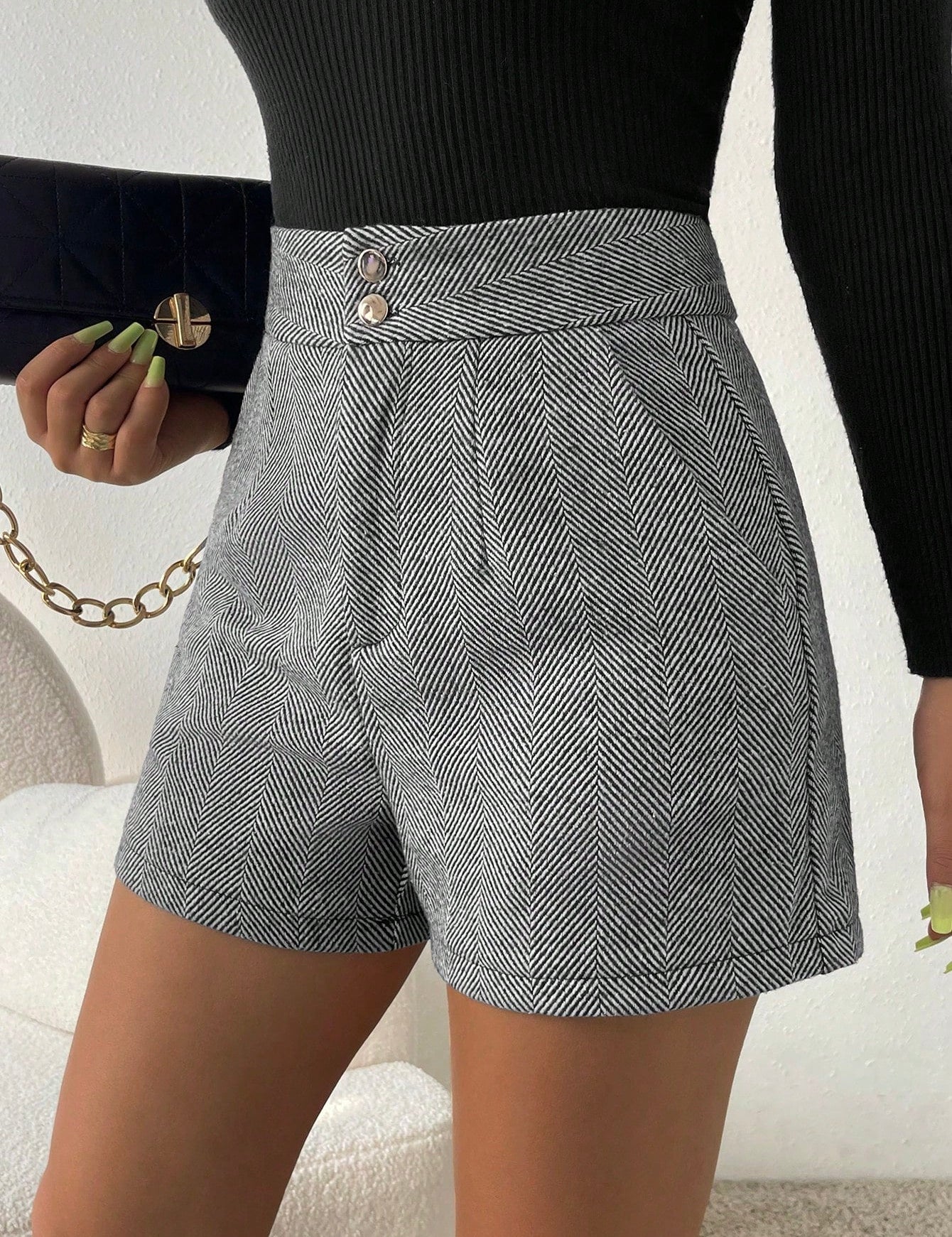 Korte broek met visgraatmotief en hoge taille