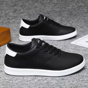 Lage skateschoenen met vetersluiting en perforaties