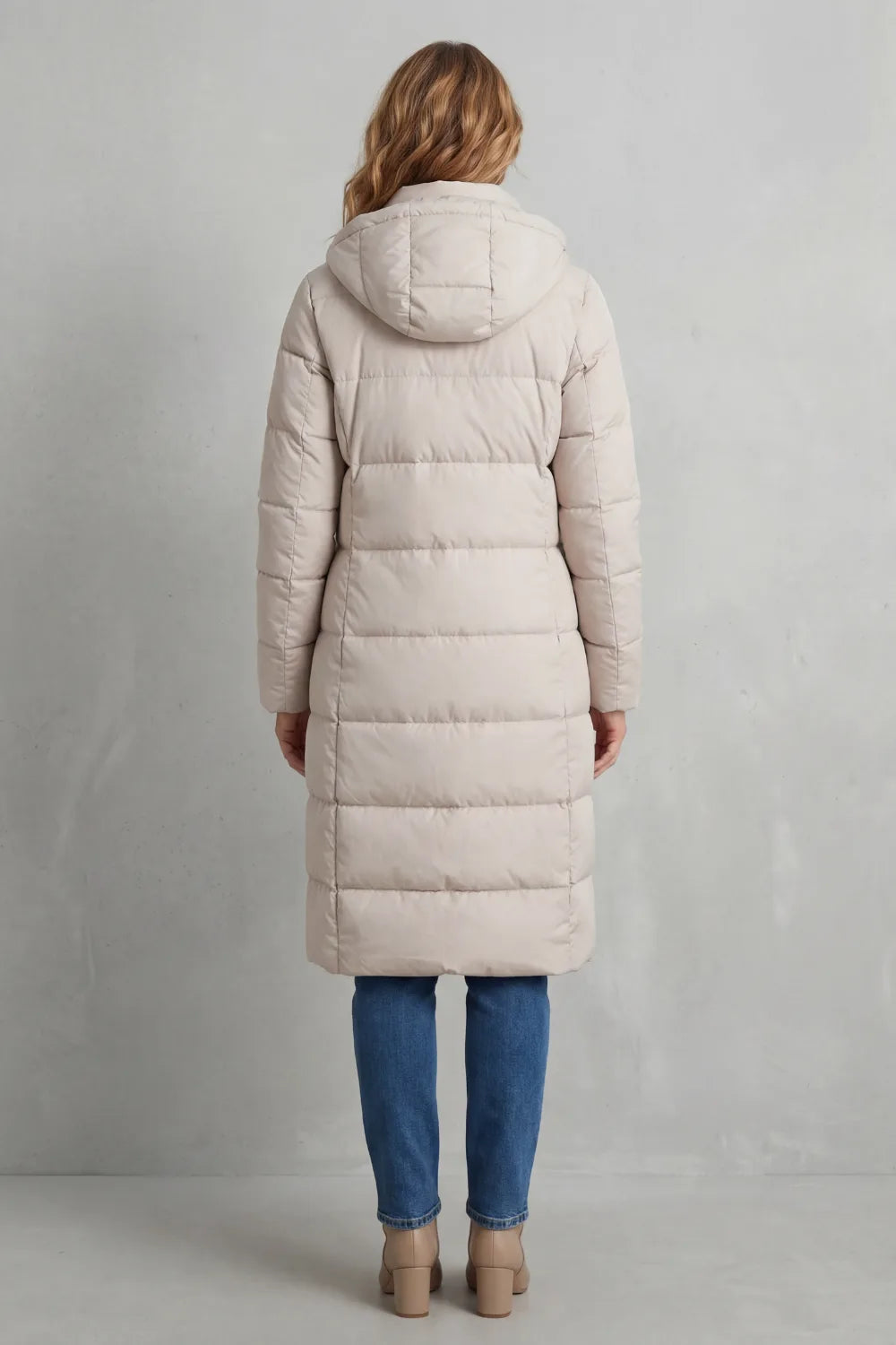 Lange puffer jas met capuchon