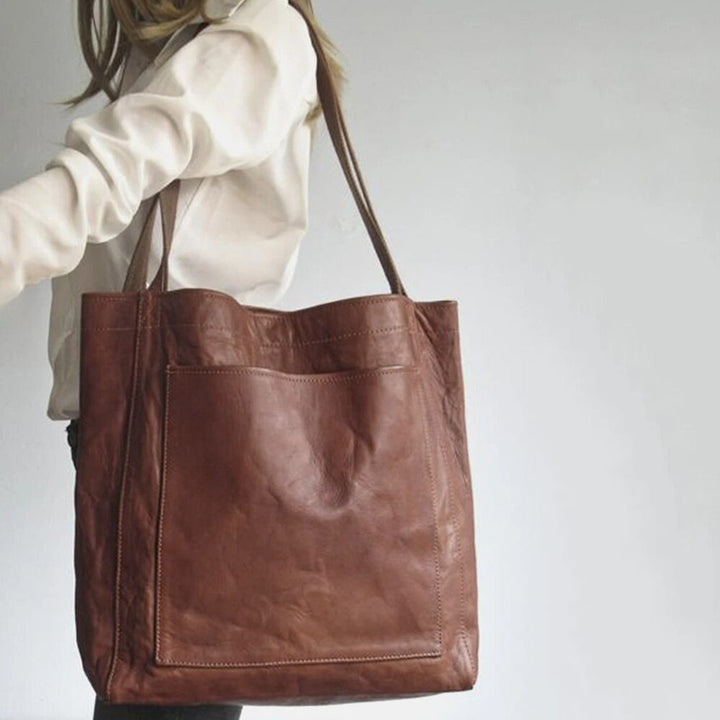 Leren tas met vlekbestendig interieur en binnenvak met rits