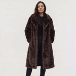 Lange faux fur jas met zakken