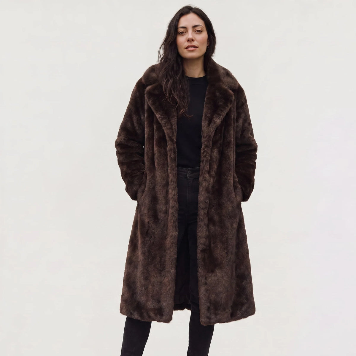 Lange faux fur jas met zakken