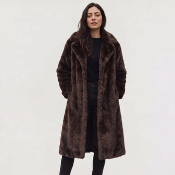 Lange faux fur jas met zakken