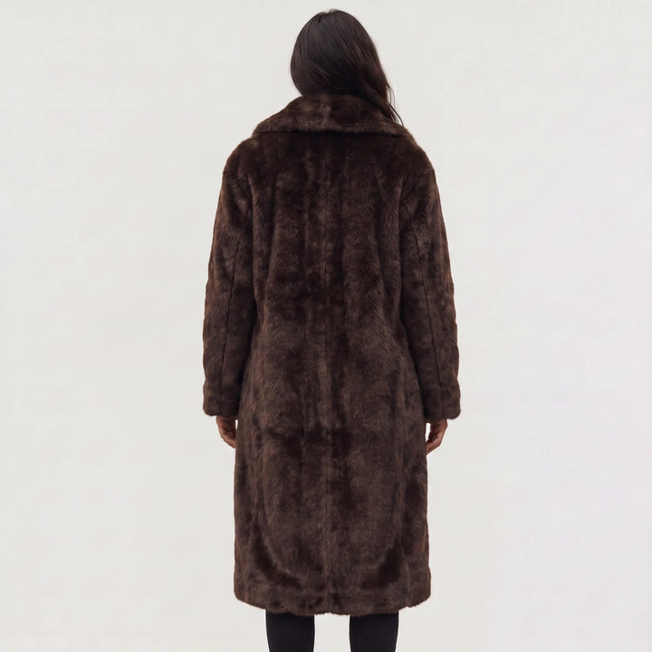 Lange faux fur jas met zakken