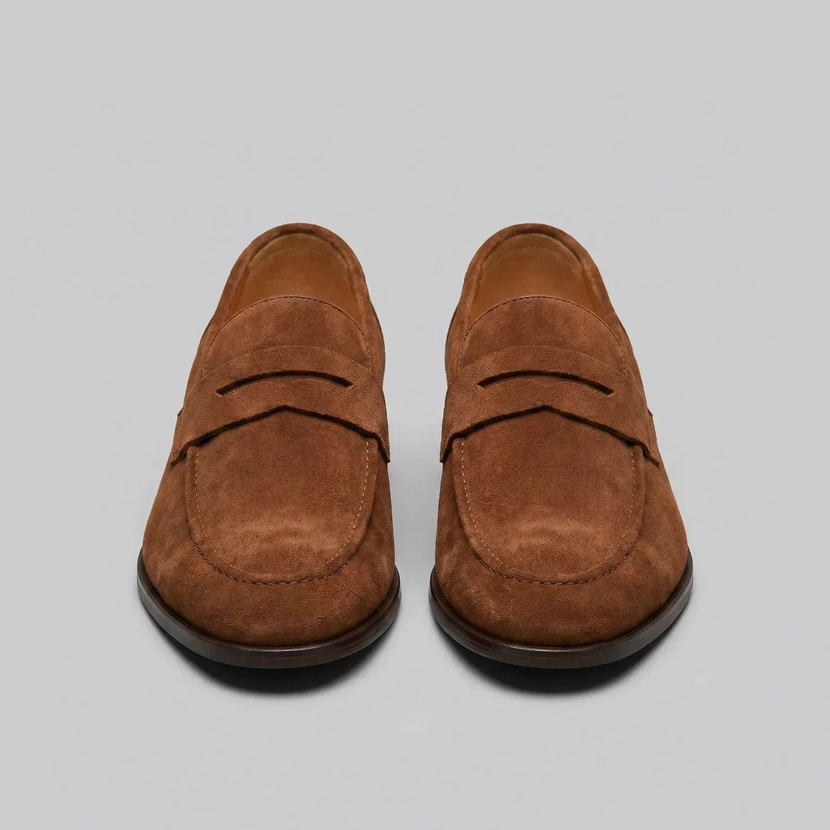 Bruine penny loafers met suède look