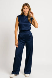 Mouwloze jumpsuit met luxe satijnlook en wijde pijpen