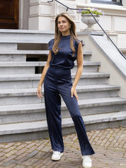Mouwloze jumpsuit met luxe satijnlook en wijde pijpen