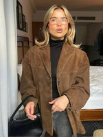 Oversized suède jas met brede kraag