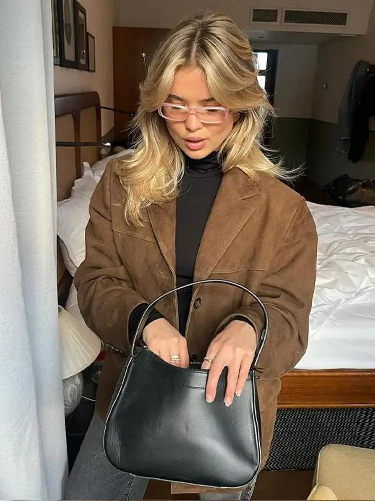 Oversized suède jas met brede kraag